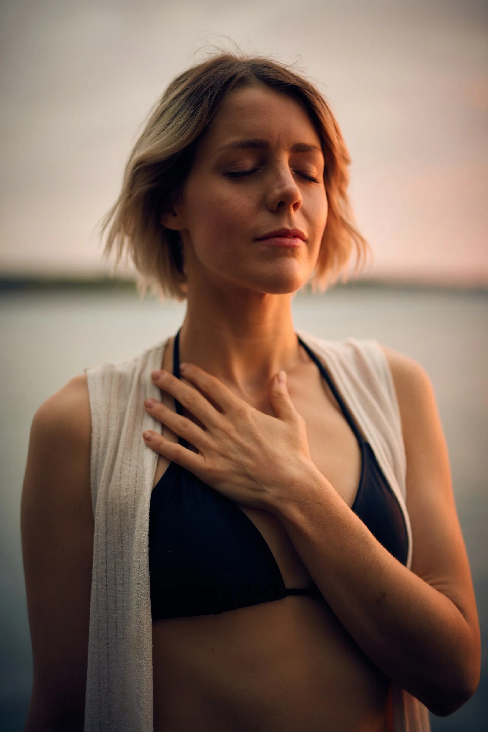 Woman pauses in reflection and meditation.