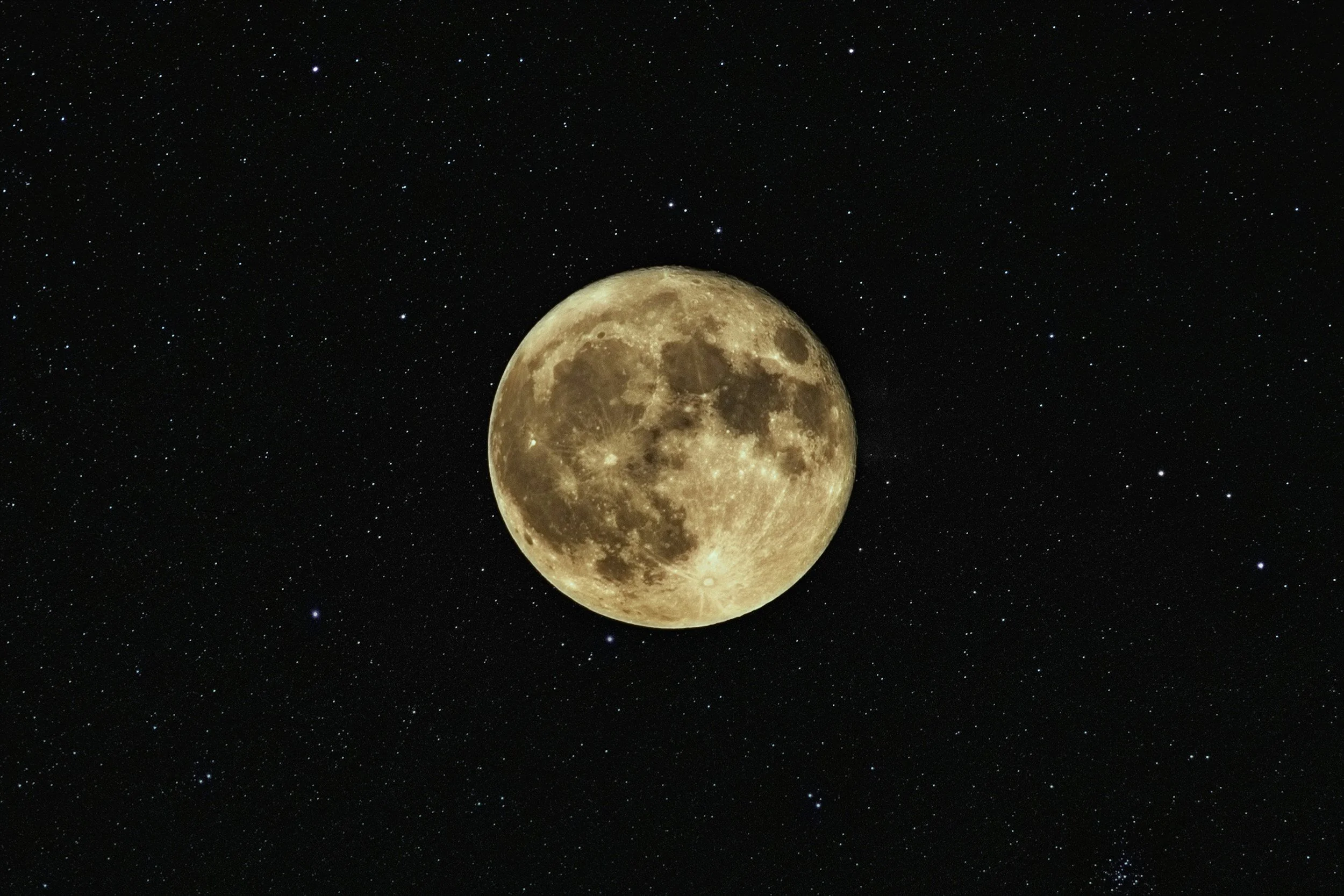 Full moon in a dark night sky