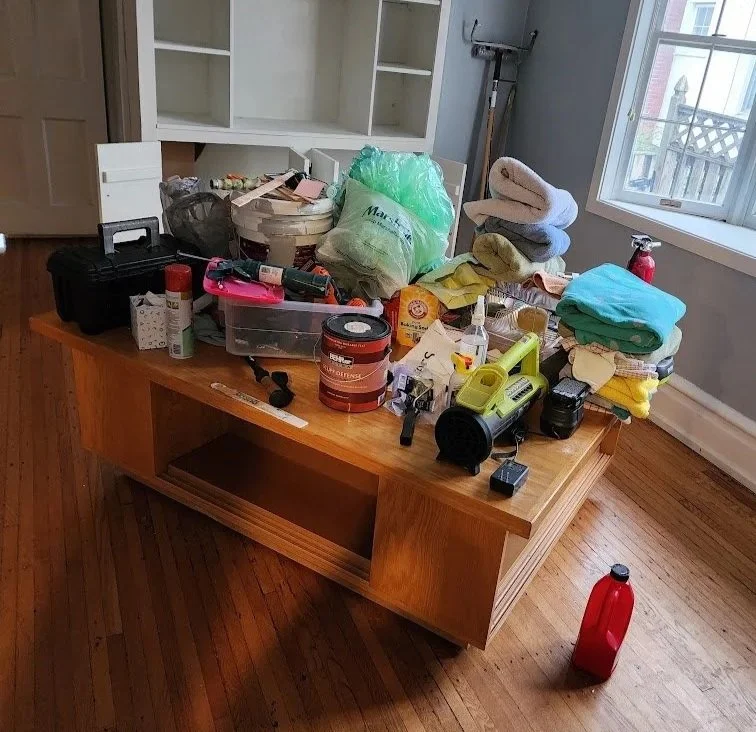 All our cleaning supplies are piled on top of this table in the middle of our old game/art room. It’s so strange to see it almost as empty as when we first got the keys.