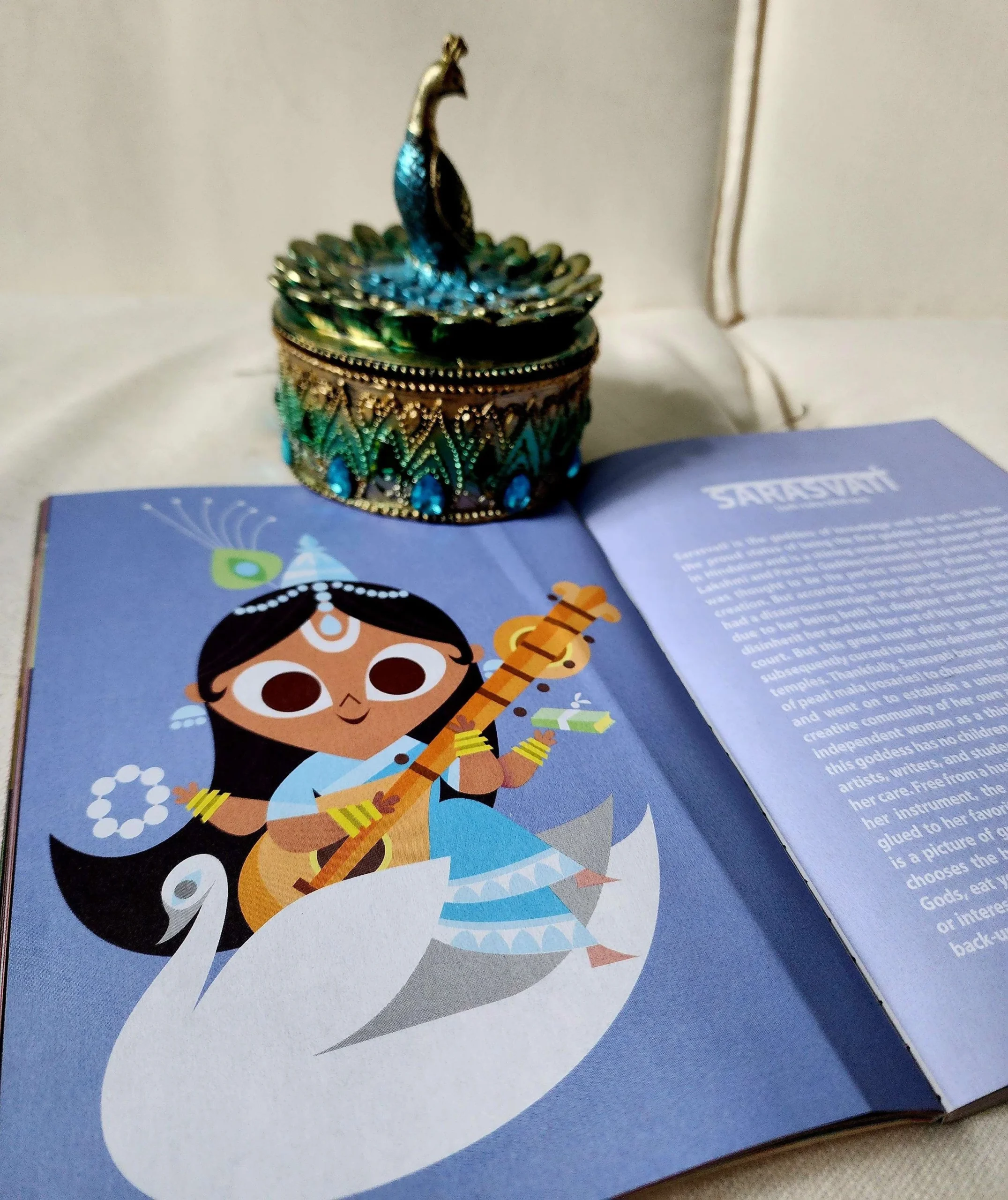 Picture from The Little Book of Hindu Deities, alongside one of my peacock decorations!
